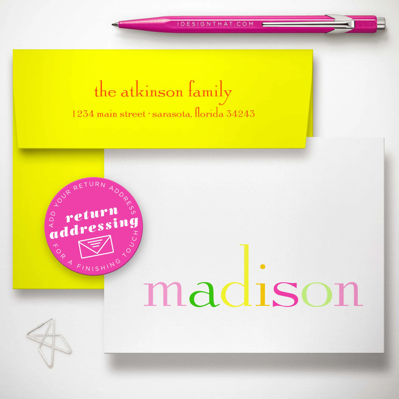 Custom return address printed on kids’ stationery envelope flap, matching rainbow folded notecard set